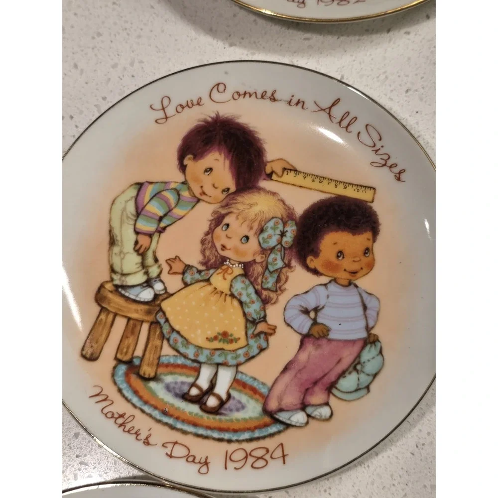 Set of 8 Avon Collectable Plates 1980s